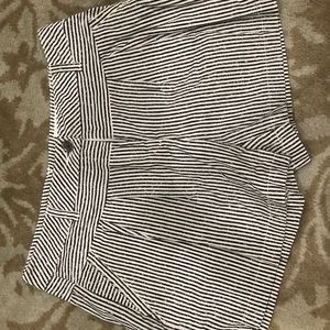 Striped shorts with front pleats